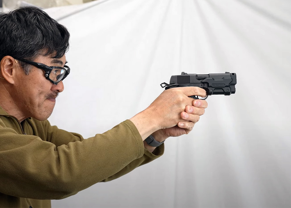 Mach Sakai With The Tokyo Marui Gun Gale Online AM.45 Black GBB Pistol